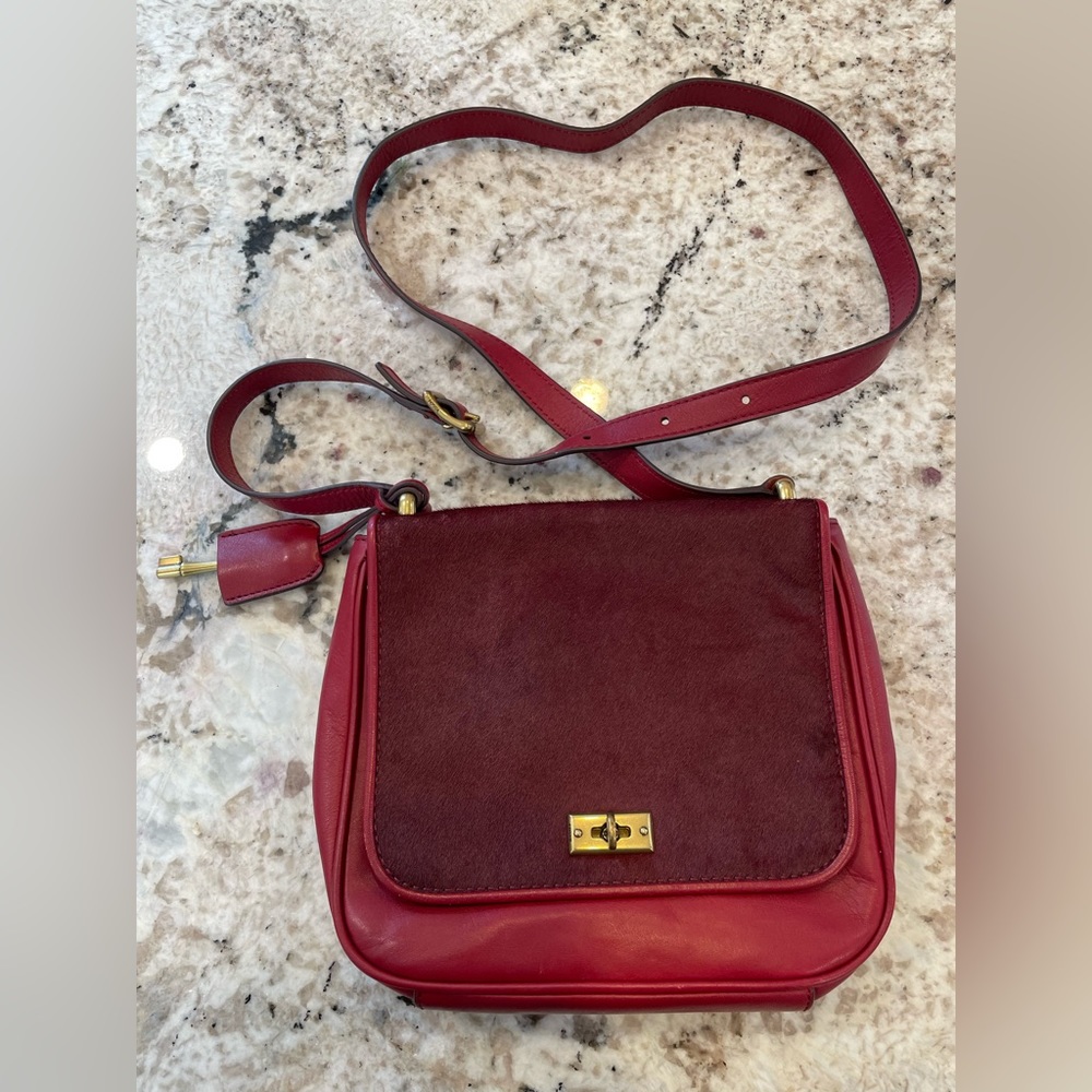 Fossil crossbody purse. 9” L x 2” W x 8” H